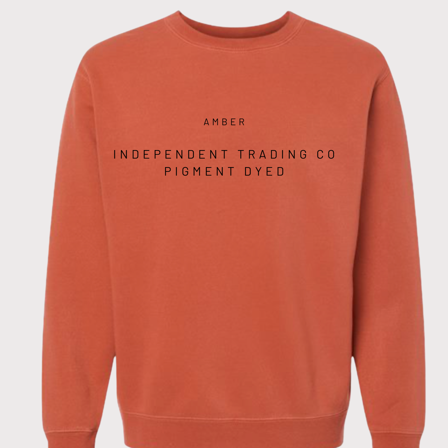 Orange sweatshirt with black text on a white background