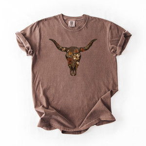 Brown t-shirt with a bull skull design on a white background