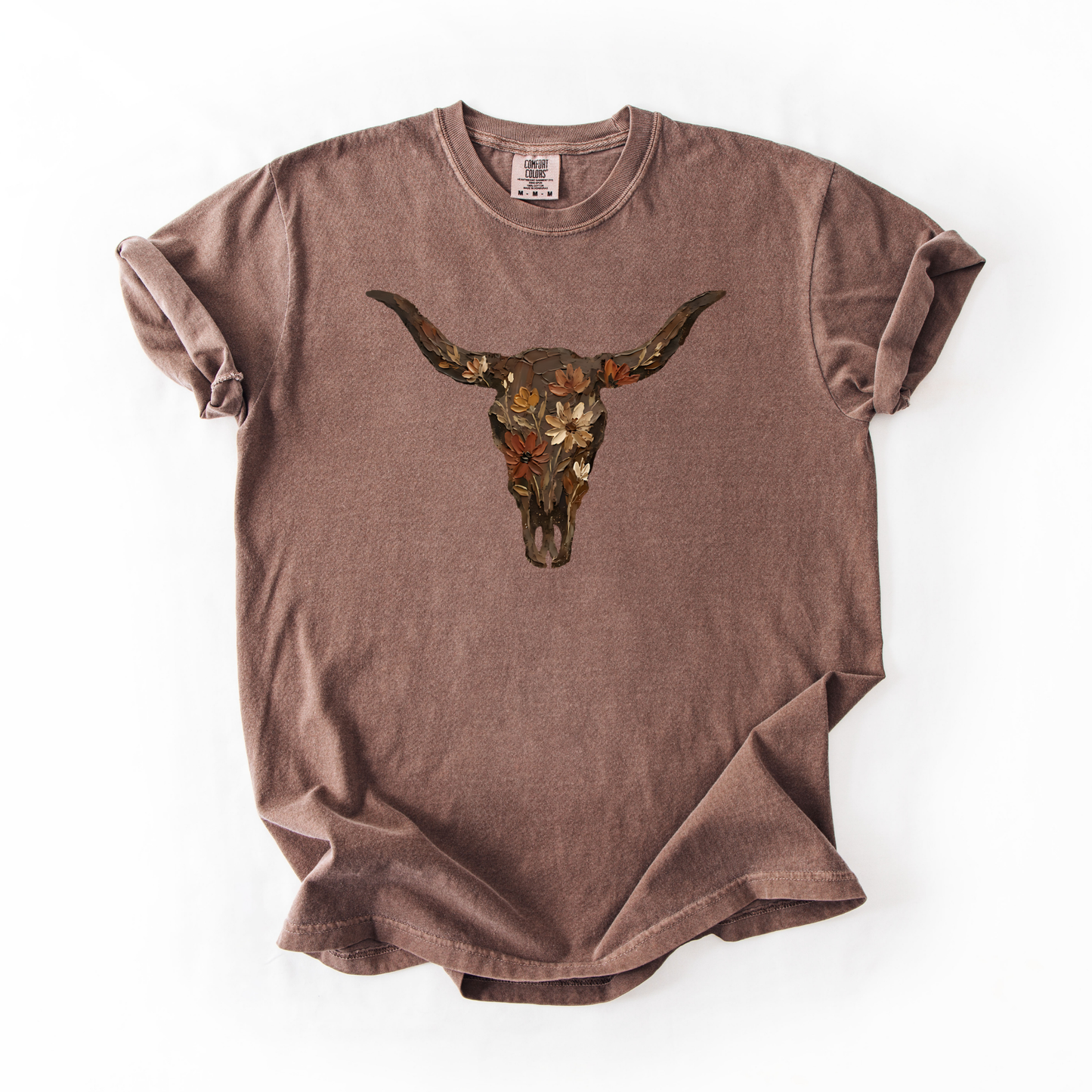Brown t-shirt with a bull skull design on a white background