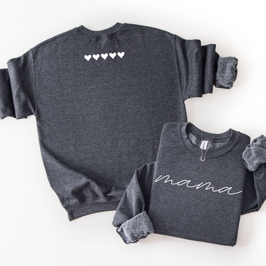 Dark gray sweatshirts with heart designs and 'mama' text on a white background