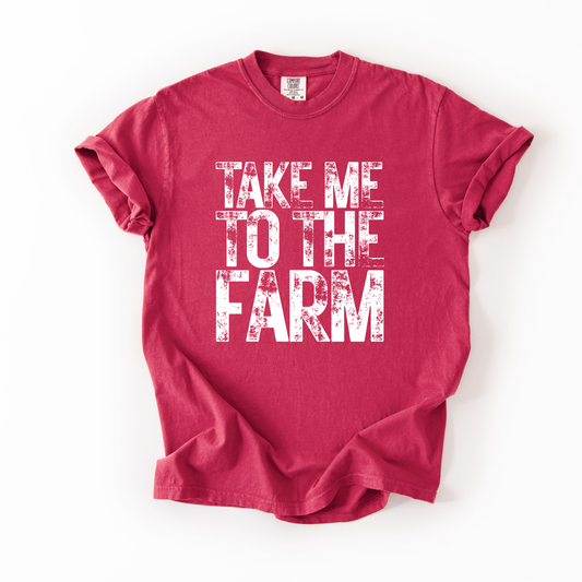 Person wearing a blue sweatshirt with 'Take Me to the Farm' text.