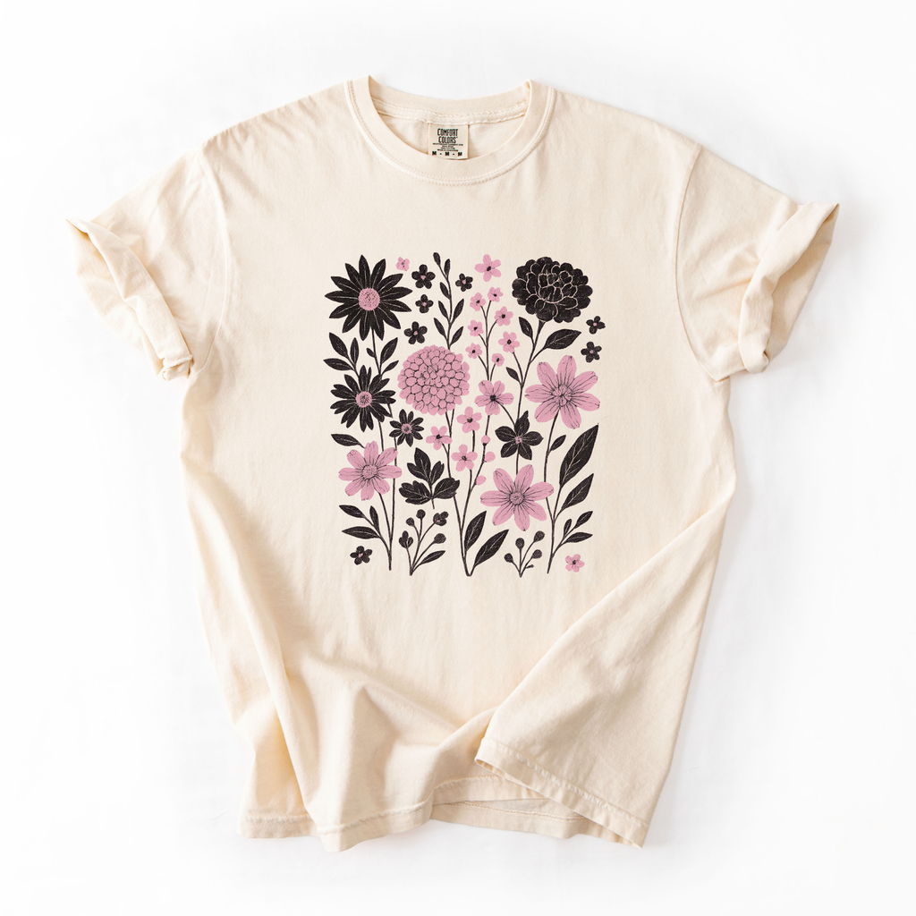 Beige t-shirt with floral design on a white background