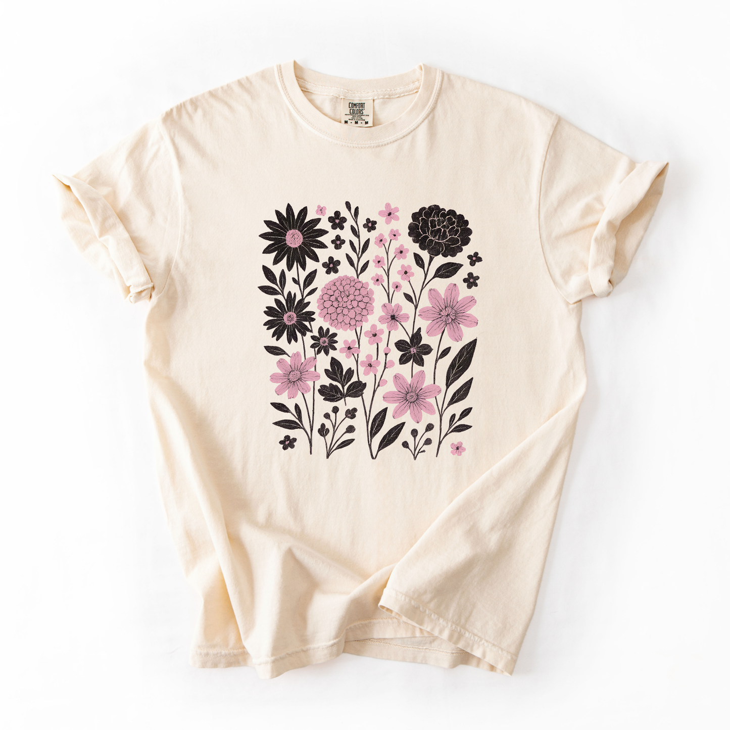 Beige t-shirt with floral design on a white background
