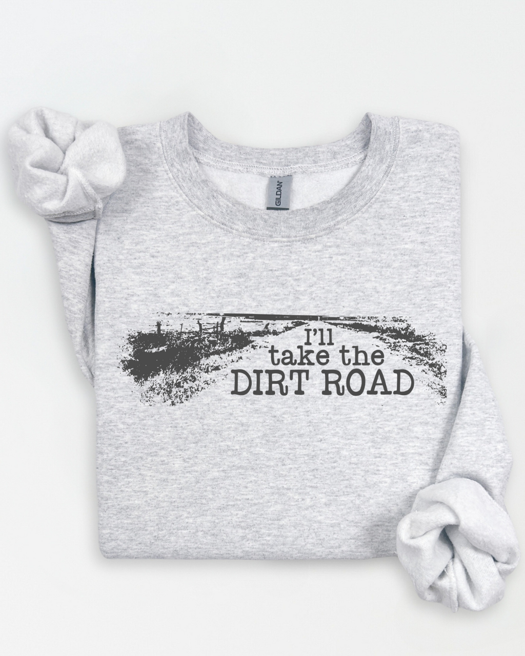 Gray sweatshirt with 'I'll take the DIRT ROAD' text on a white background