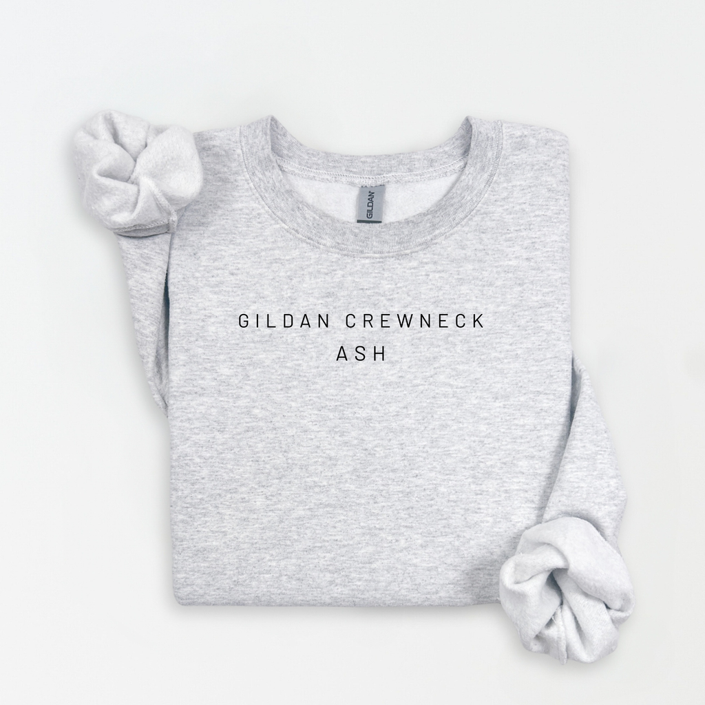 Folded gray Gildan crewneck sweatshirt on a white background