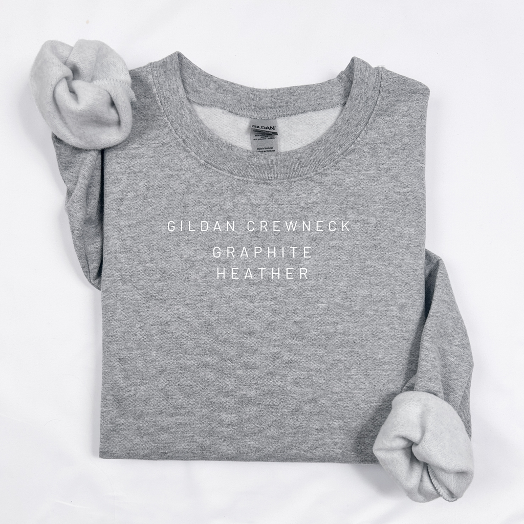 Gray sweatshirt with 'Gildan Crewneck Graphite Heather' text on a white background