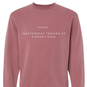 Maroon long-sleeve shirt with white text on a white background