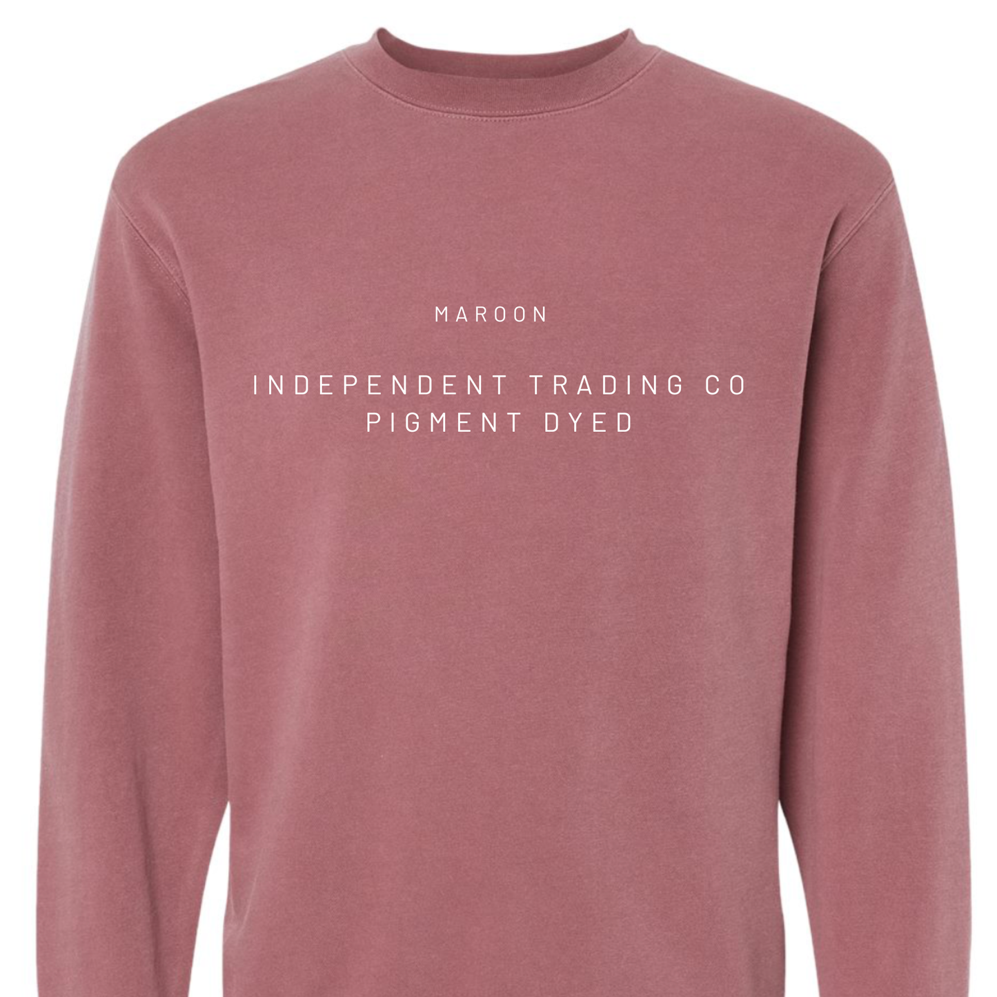 Maroon long-sleeve shirt with white text on a white background