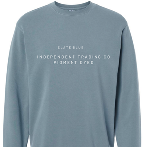 Slate blue long-sleeve shirt with white text on a white background