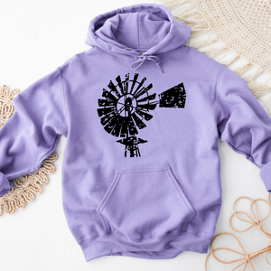 A purple hooded sweatshirt with a black and white printed windmill design on the front.